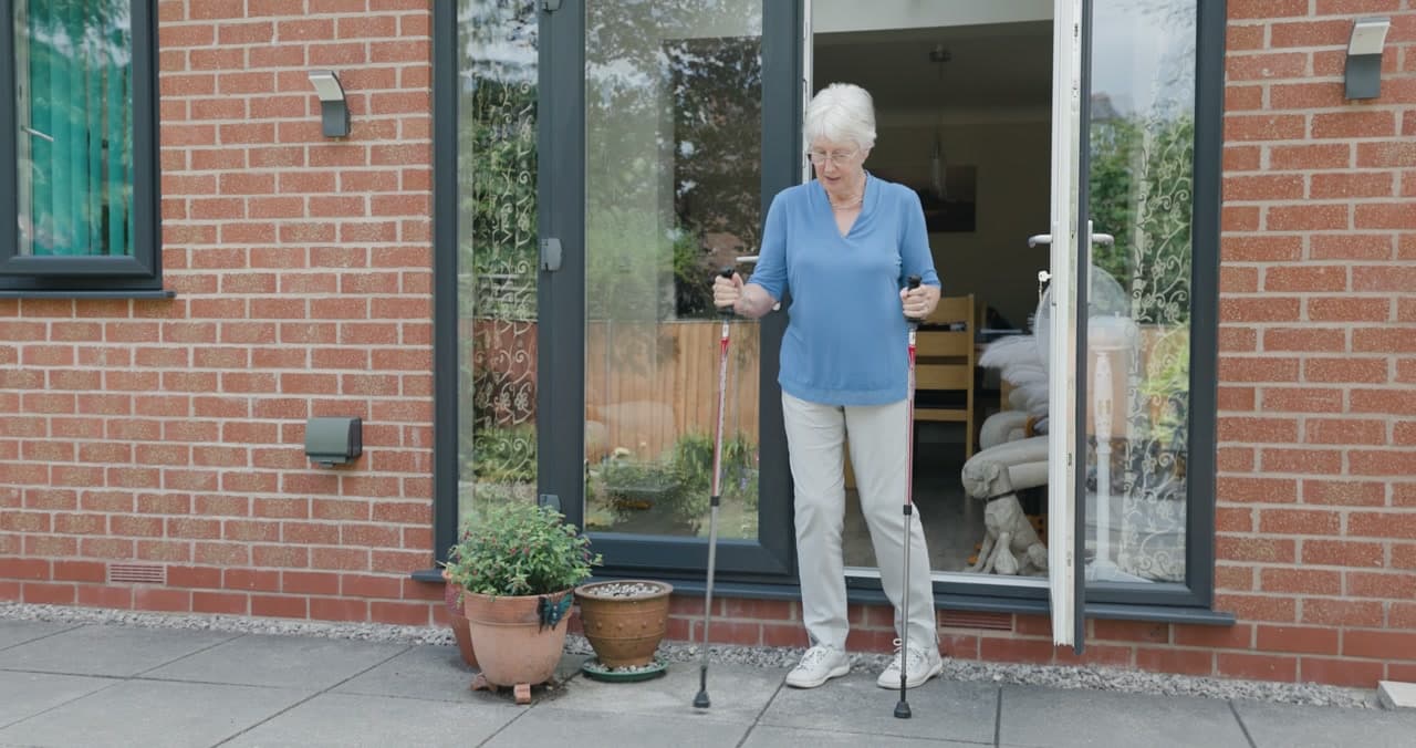 Lindsay standing outdoors with her Activator Poles
